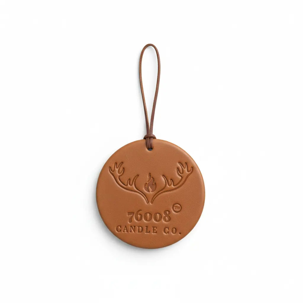 Studio product photo of leather air freshener tag